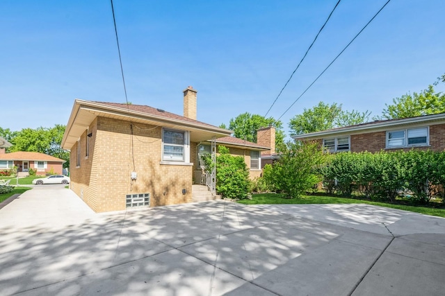 1919 Sunnyside Ave, Westchester, IL 60154 - back of property with brick siding and a chimney