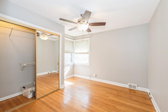 1919 Sunnyside Ave, Westchester, IL 60154 - unfurnished bedroom with a closet, light wood finished floors, baseboards, and ceiling fan