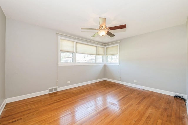 1919 Sunnyside Ave, Westchester, IL 60154 - unfurnished room with light wood finished floors, ceiling fan, and baseboards