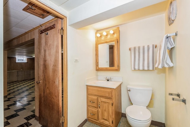 1919 Sunnyside Ave, Westchester, IL 60154 - bathroom featuring vanity, toilet, and baseboards