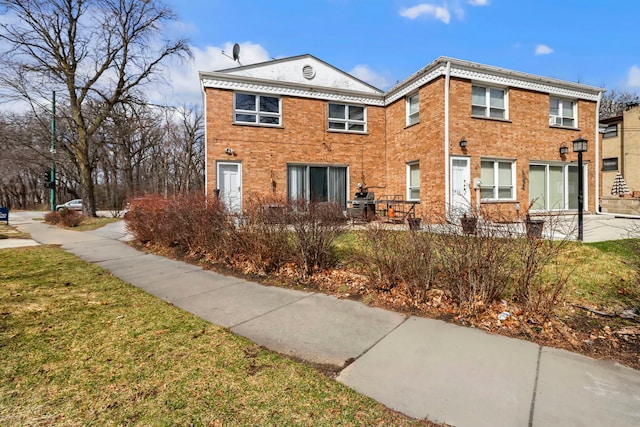 5770 N Forest Glen Ave, Chicago, IL 60646 - exterior space with brick siding and a front lawn