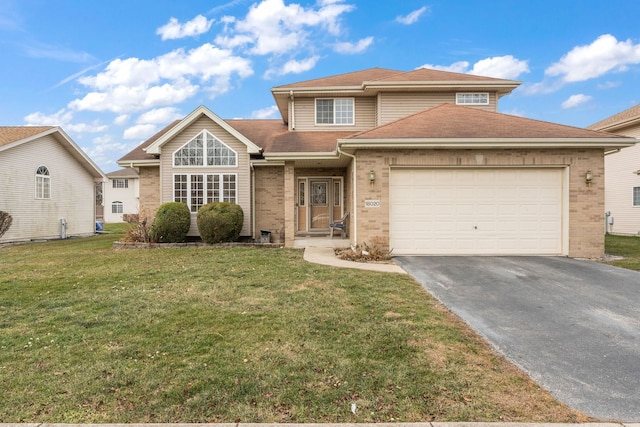 18020 Charlotte Dr, Lansing, IL 60438 - traditional-style home with a front yard, brick siding, driveway, and an attached garage