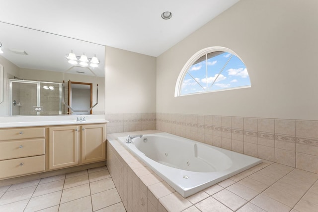 18020 Charlotte Dr, Lansing, IL 60438 - full bath with tile patterned flooring, a jetted tub, vanity, and a stall shower