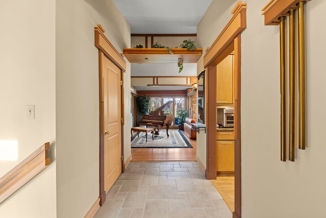 8712 W 121st St, Palos Park, IL 60464 - corridor with stone tile floors and baseboards