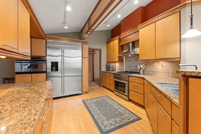 8712 W 121st St, Palos Park, IL 60464 - kitchen with premium appliances, wall chimney range hood, track lighting, light wood-type flooring, and backsplash