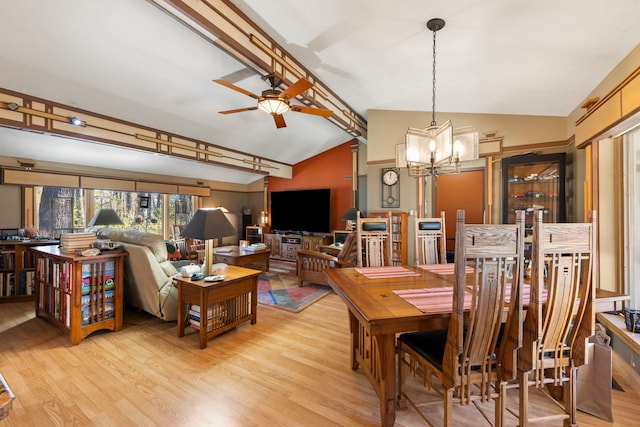 8712 W 121st St, Palos Park, IL 60464 - dining area featuring vaulted ceiling, a chandelier, light wood-type flooring, and ceiling fan