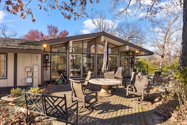 8712 W 121st St, Palos Park, IL 60464 - view of patio / terrace with a sunroom
