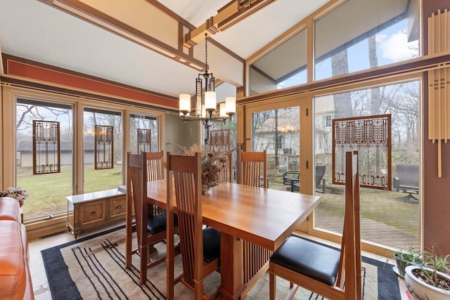 8712 W 121st St, Palos Park, IL 60464 - dining area featuring a chandelier, plenty of natural light, and vaulted ceiling