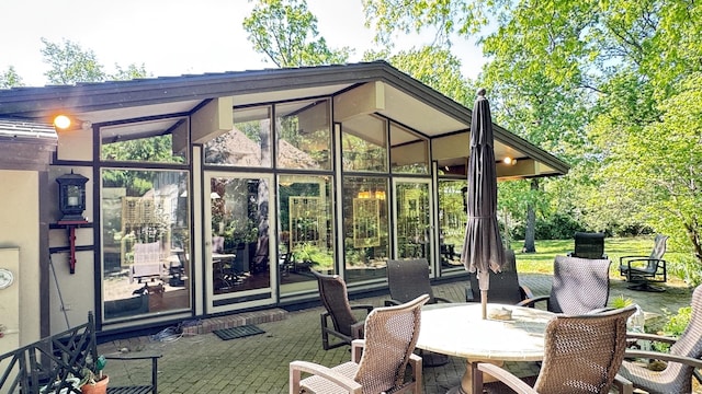 8712 W 121st St, Palos Park, IL 60464 - view of patio / terrace with a sunroom