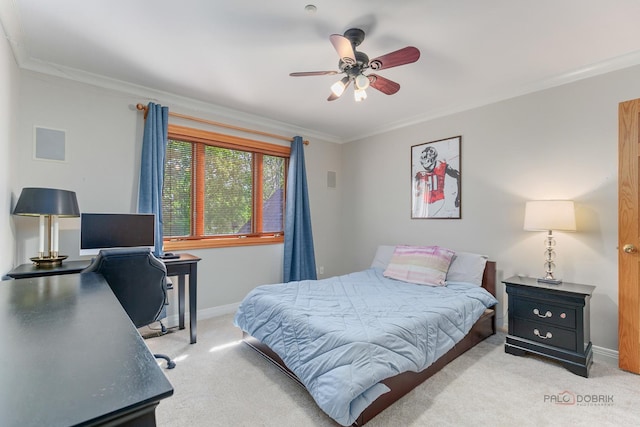 bedroom with carpet, baseboards, ornamental molding, and an office area
