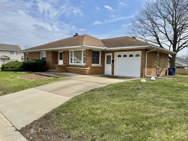 1002 7th St, Peru, IL 61354 - ranch-style home with a front yard, a garage, concrete driveway, brick siding, and roof with shingles