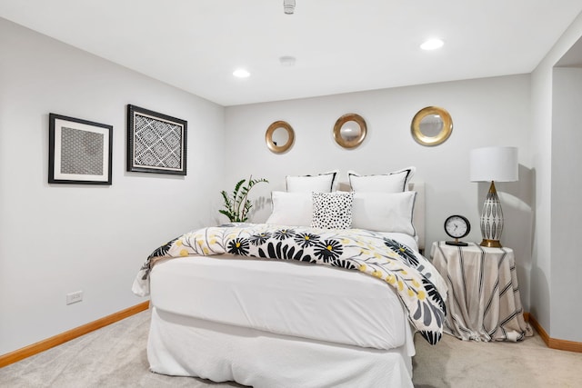 carpeted bedroom with baseboards and recessed lighting