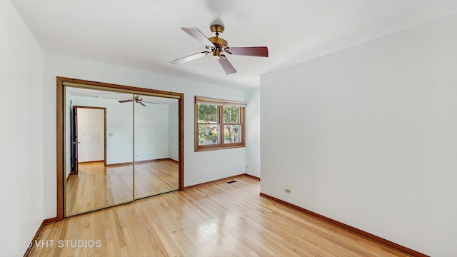 1144 Jane Ave, Naperville, IL 60540 - unfurnished bedroom with light wood finished floors, a closet, and a ceiling fan