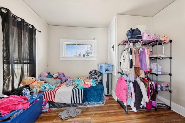 123 Philippa Ave, Waukegan, IL 60085 - bedroom with wood finished floors and crown molding