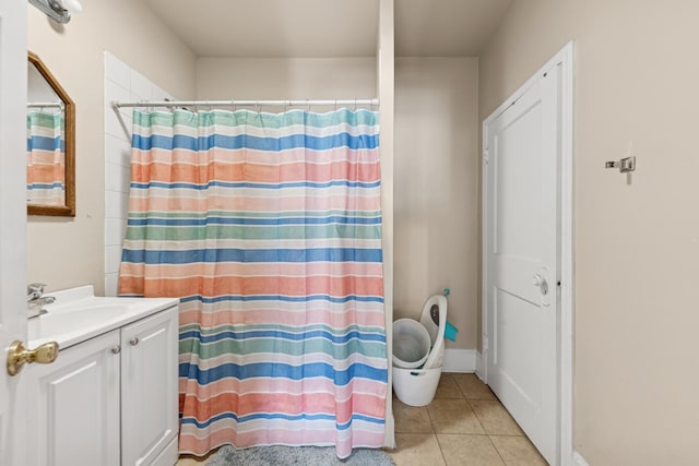 123 Philippa Ave, Waukegan, IL 60085 - full bathroom with vanity, tile patterned flooring, and a shower with shower curtain