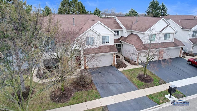 514 E Thornhill Ln, Palatine, IL 60074 - traditional-style home featuring a garage, aphalt driveway, brick siding, and a shingled roof