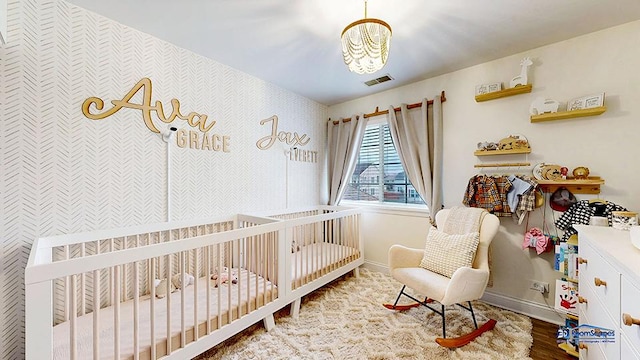 514 E Thornhill Ln, Palatine, IL 60074 - bedroom featuring a chandelier, a crib, visible vents, and baseboards