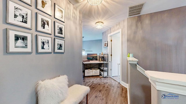 514 E Thornhill Ln, Palatine, IL 60074 - hallway featuring visible vents, an inviting chandelier, and wood finished floors