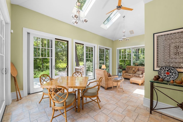 8673 Timber Ridge Dr, Burr Ridge, IL 60527 - sunroom / solarium with a skylight, stone tile flooring, baseboards, and high vaulted ceiling