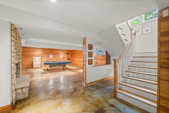 8673 Timber Ridge Dr, Burr Ridge, IL 60527 - playroom with wooden walls, finished concrete flooring, pool table, and baseboards