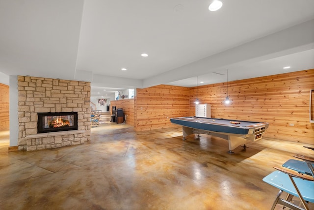 8673 Timber Ridge Dr, Burr Ridge, IL 60527 - playroom with concrete floors, wood walls, billiards, a fireplace, and recessed lighting