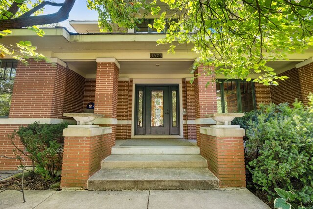 8673 Timber Ridge Dr, Burr Ridge, IL 60527 - view of exterior entry with brick siding