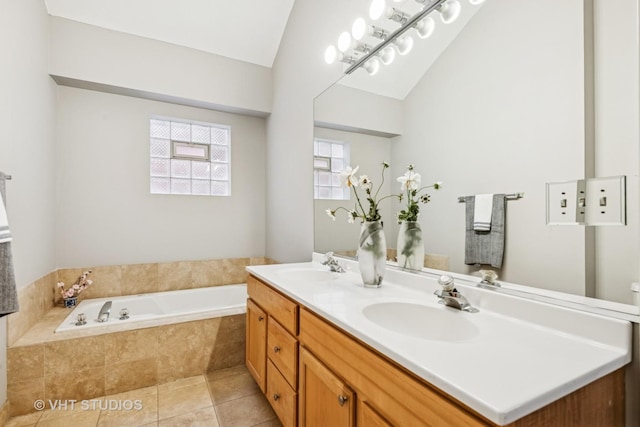 2336 W Harrison St Unit 4, Chicago, IL 60612 - full bath featuring vaulted ceiling, a garden tub, double vanity, and tile patterned floors