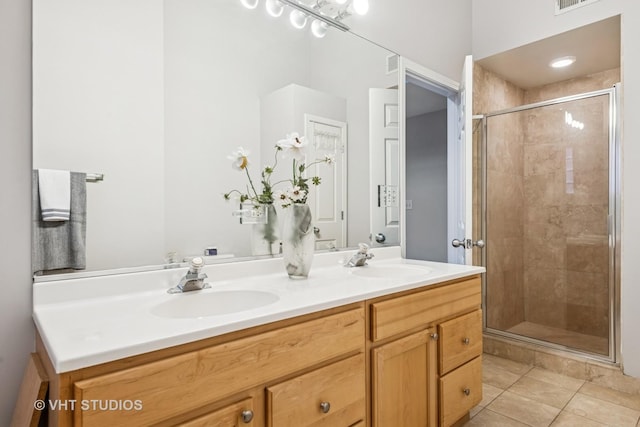 2336 W Harrison St Unit 4, Chicago, IL 60612 - full bath with a stall shower, tile patterned flooring, and double vanity