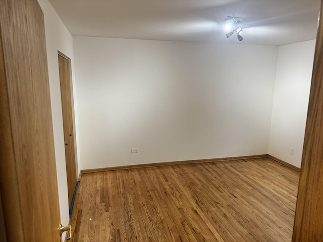 unfurnished room featuring wood finished floors