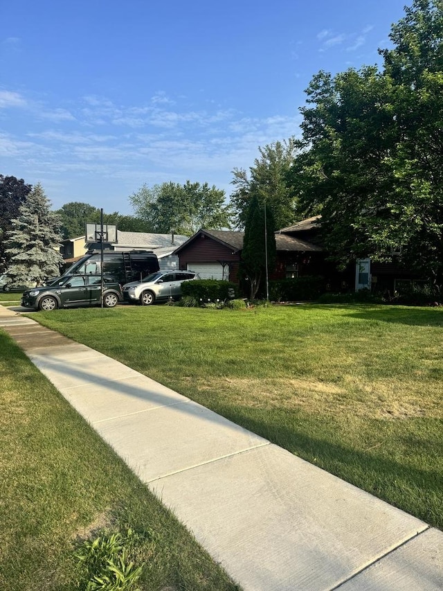view of home's exterior featuring a lawn