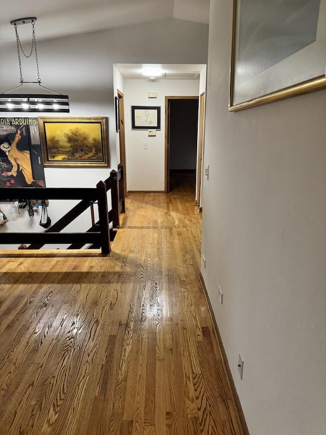 corridor with wood finished floors