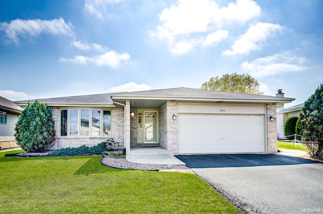 9147 Boardwalk Ter, Orland Hills, IL 60487 - ranch-style house with brick siding, driveway, an attached garage, and a front lawn