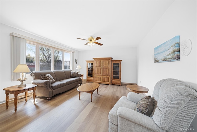 9147 Boardwalk Ter, Orland Hills, IL 60487 - living room with light wood-style floors, baseboards, and ceiling fan