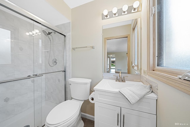 9147 Boardwalk Ter, Orland Hills, IL 60487 - bathroom with toilet, vanity, and a shower stall