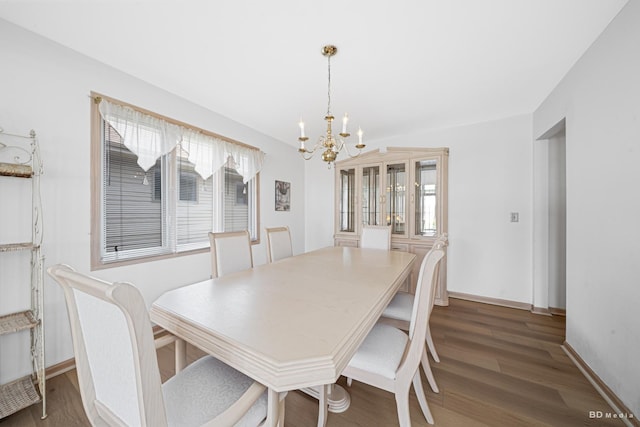 9147 Boardwalk Ter, Orland Hills, IL 60487 - dining room with wood finished floors, an inviting chandelier, baseboards, and a wealth of natural light
