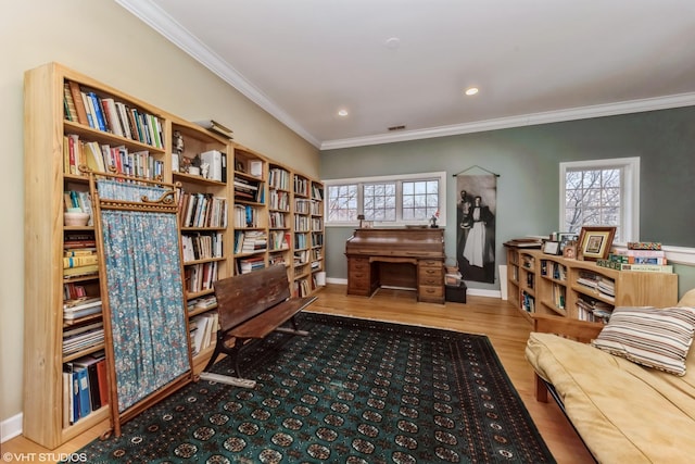sitting room featuring visible vents, baseboards, ornamental molding, recessed lighting, and wood finished floors