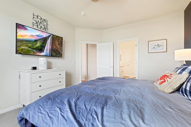 carpeted bedroom with baseboards