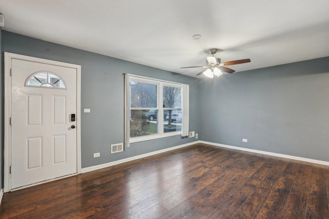 entrance foyer with hardwood / wood-style floors, baseboards, a ceiling fan, and a wealth of natural light