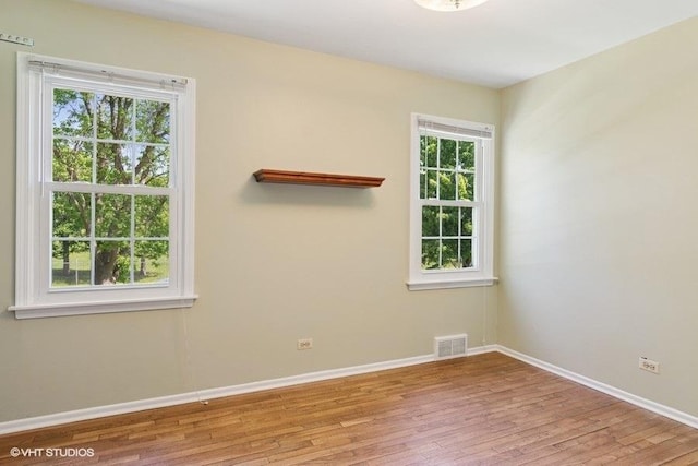 21 39th St, Downers Grove, IL 60515 - unfurnished room with wood finished floors and baseboards