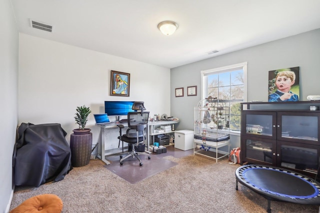 carpeted office featuring visible vents