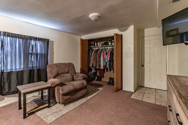 sitting room with carpet flooring