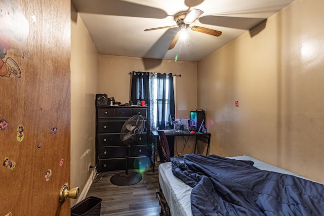 bedroom featuring wood finished floors and ceiling fan