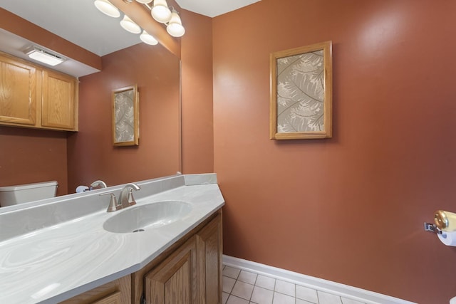 22W128 Butterfield Rd, Glen Ellyn, IL 60137 - bathroom featuring tile patterned floors, toilet, vanity, and baseboards