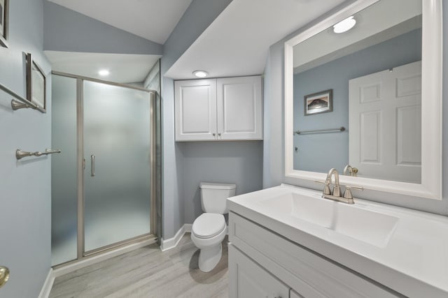 22W128 Butterfield Rd, Glen Ellyn, IL 60137 - full bath with toilet, wood finished floors, a stall shower, baseboards, and vanity