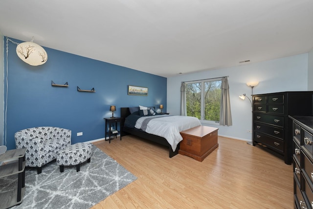 22W128 Butterfield Rd, Glen Ellyn, IL 60137 - bedroom featuring light wood finished floors and baseboards