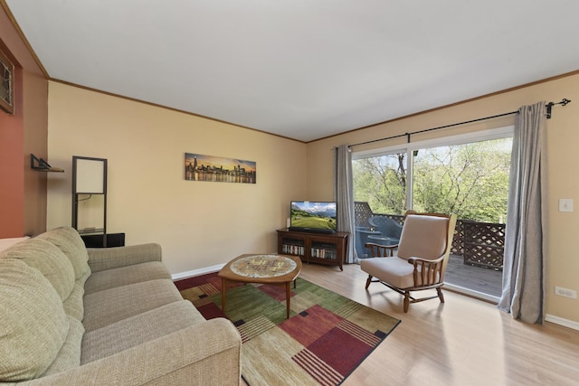22W128 Butterfield Rd, Glen Ellyn, IL 60137 - living area with crown molding, light wood-style floors, and baseboards
