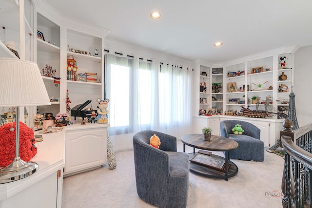 sitting room featuring recessed lighting and light carpet