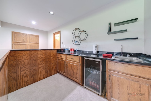bar featuring recessed lighting, a sink, light colored carpet, and beverage cooler