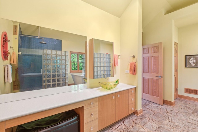 full bathroom with visible vents, baseboards, walk in shower, vanity, and marble finish floor