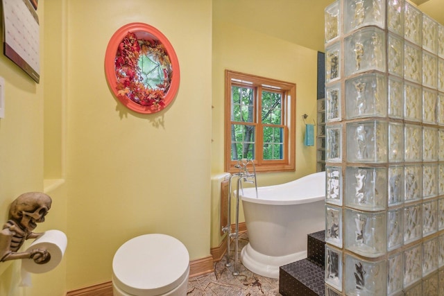 bathroom with a freestanding bath and walk in shower